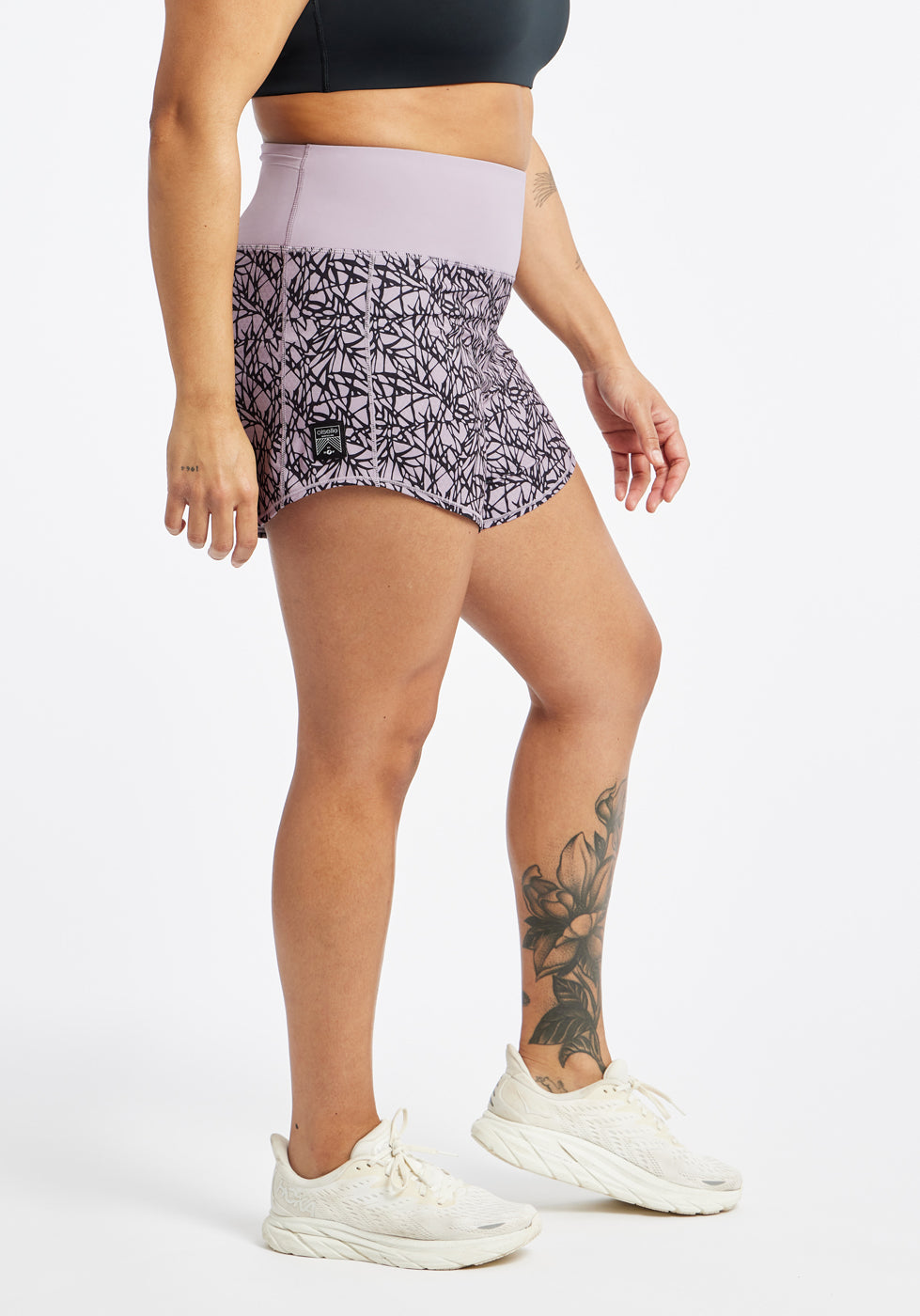 High Rise Roga 4" Running Shorts in Light Purple Lavender print in size 10, side view
