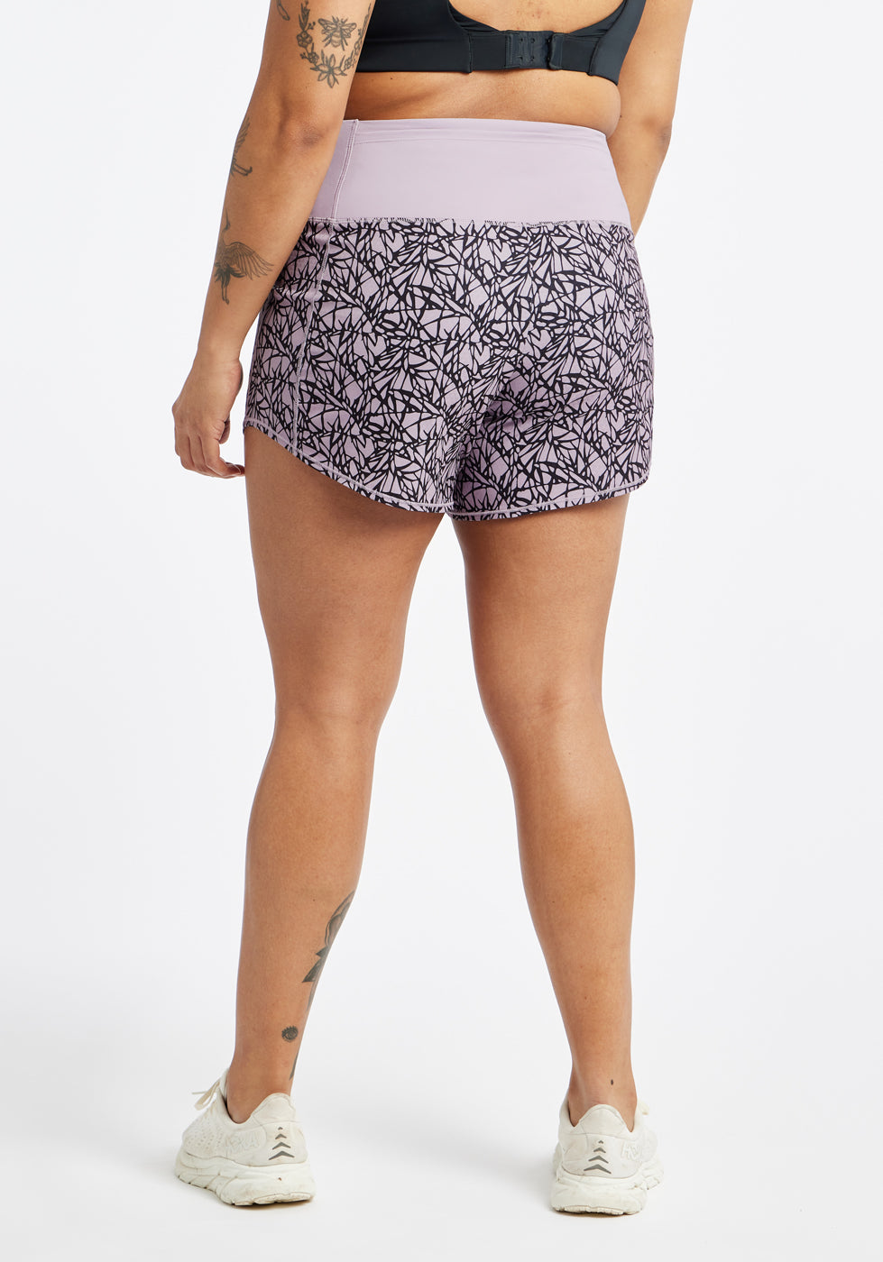 High Rise Roga 4" Running Shorts in Light Purple Lavender print in size 10, back view