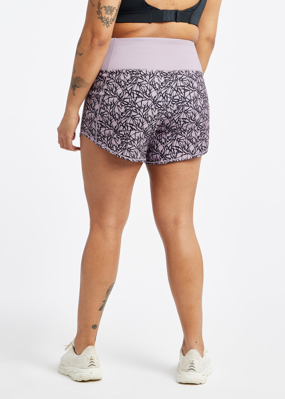High Rise Roga 4" Running Shorts in Light Purple Lavender print in size 10, back view
