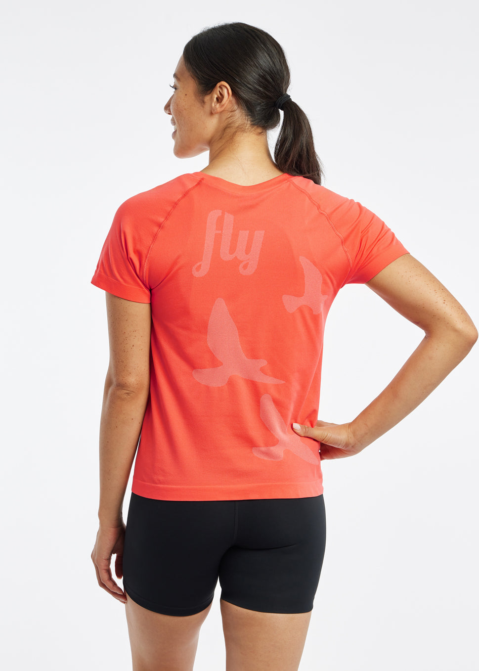 Altitude Short Sleeve in orange, back view
