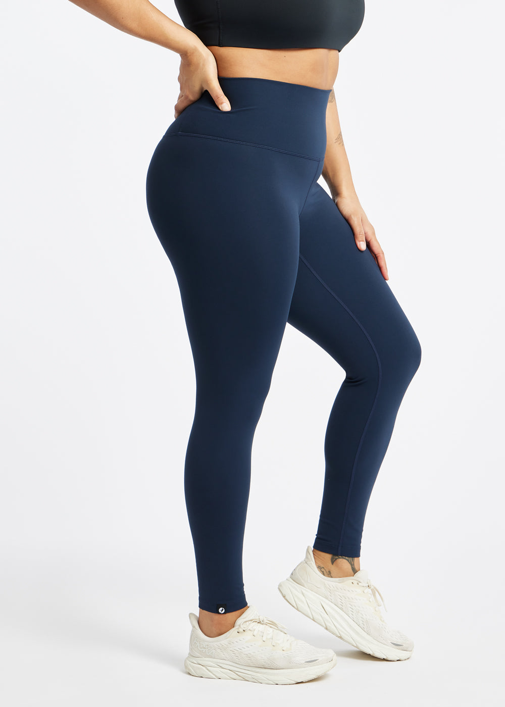 Essential Bird 7/8 length Running Tights in Ink Blue, side