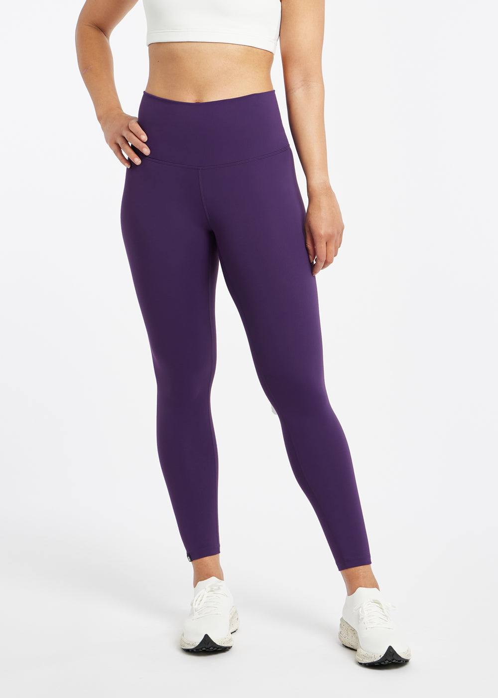 Essential Bird 7/8 length Running Tights in Twilight purple, front view