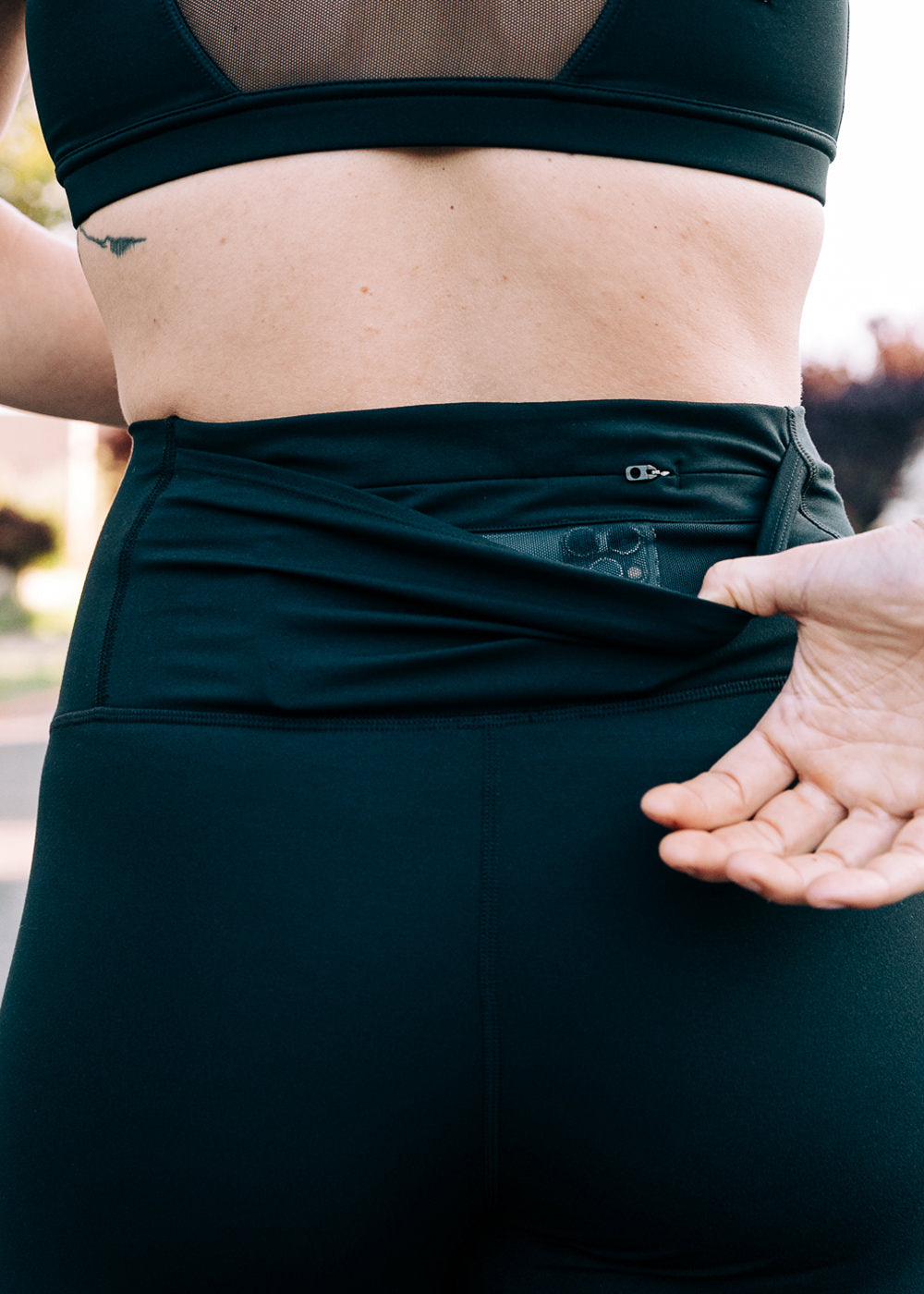 Essential Bird 3/4 length Running Tights in black, back pocket