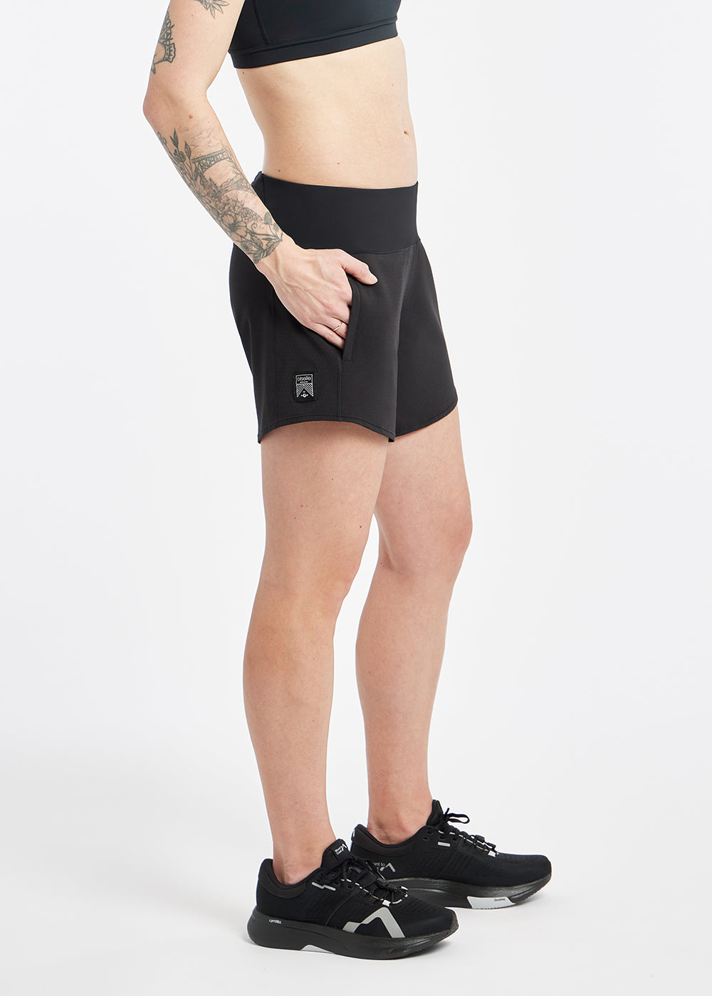 Roga 6" Running Shorts in Black, side view