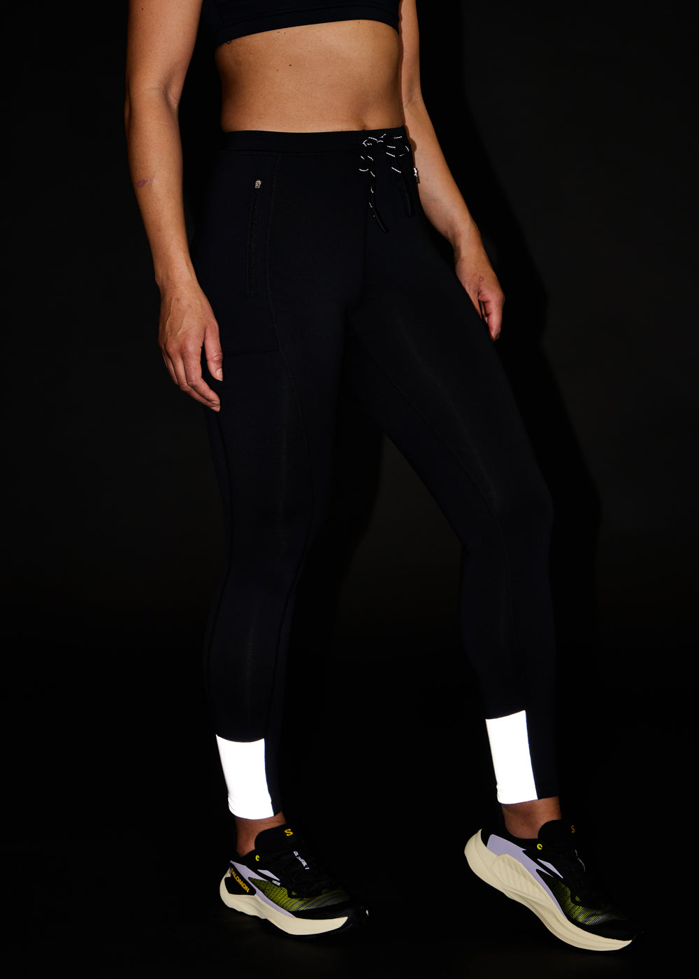 Fireglow Fleece Running Tights in Black, with reflective leg panels