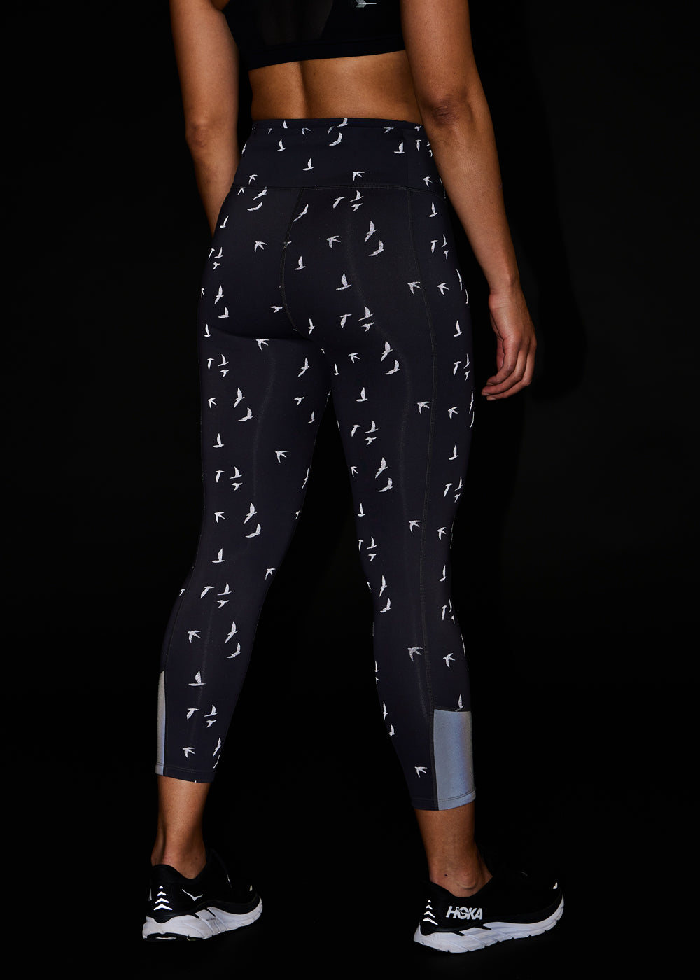 Firecracker Reflective Tights in Obsidian grey, back view