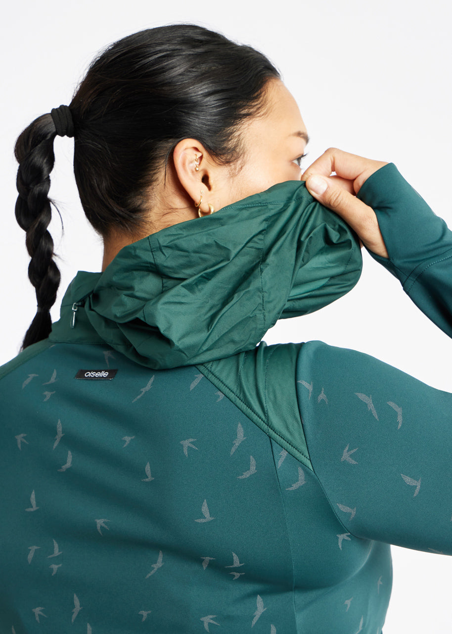 Firecracker Insulated Running Jacket in Juniper green, packable hood