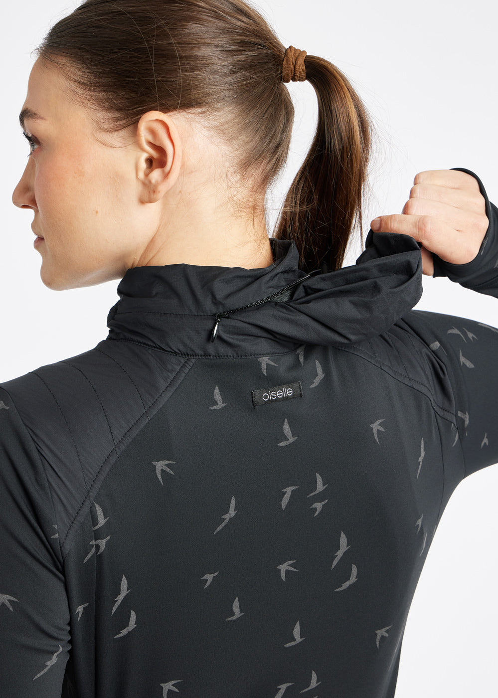Firecracker Insulated Running Jacket in Black, packable hood