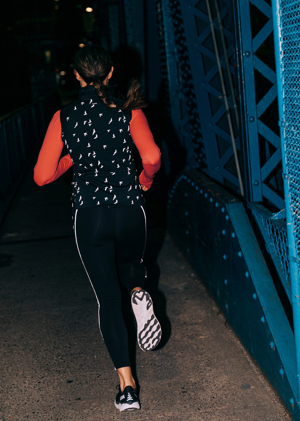 Firecracker Insulated Running Vest in Black, reflective