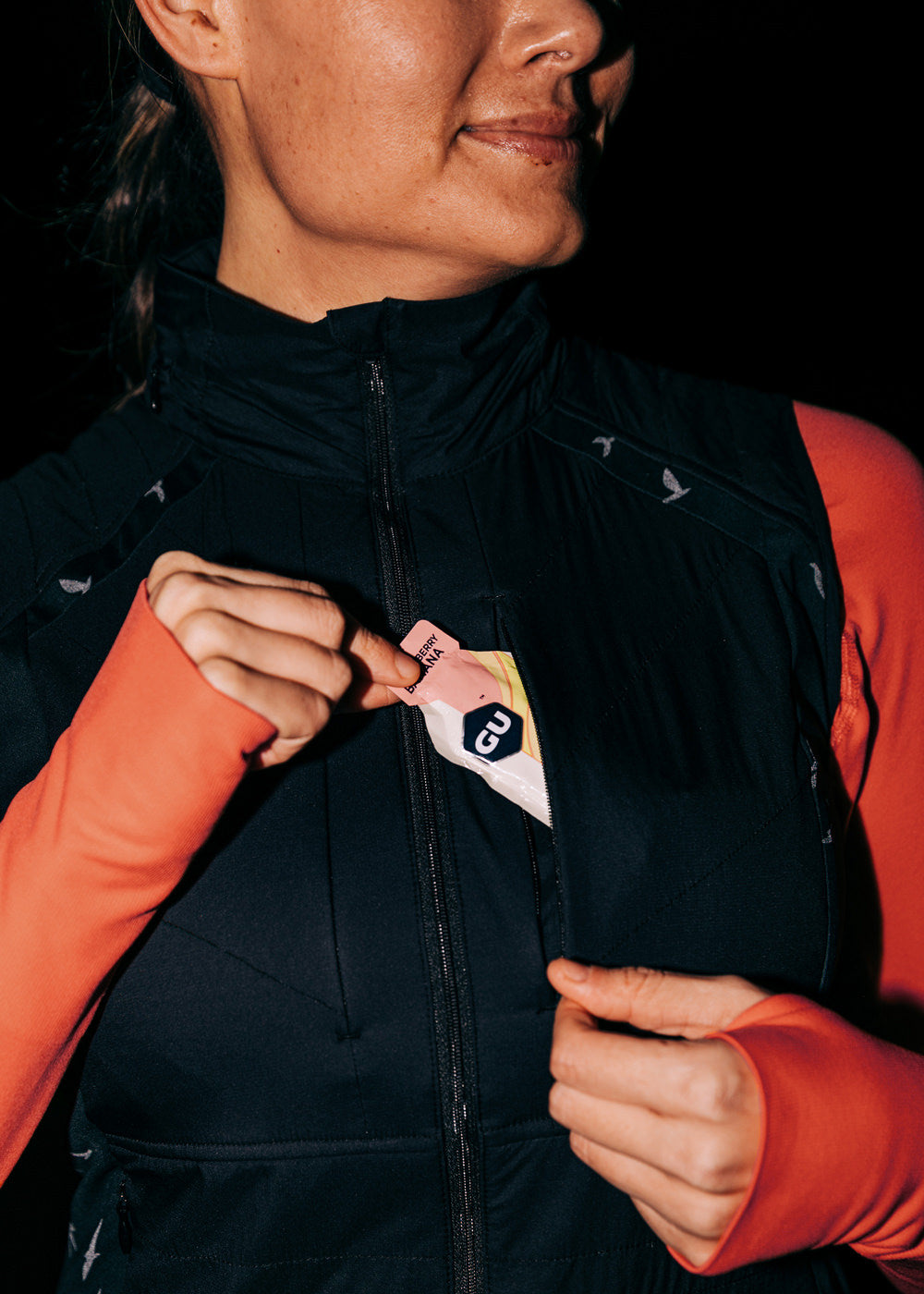 Firecracker Insulated Running Vest in Black, front pocket