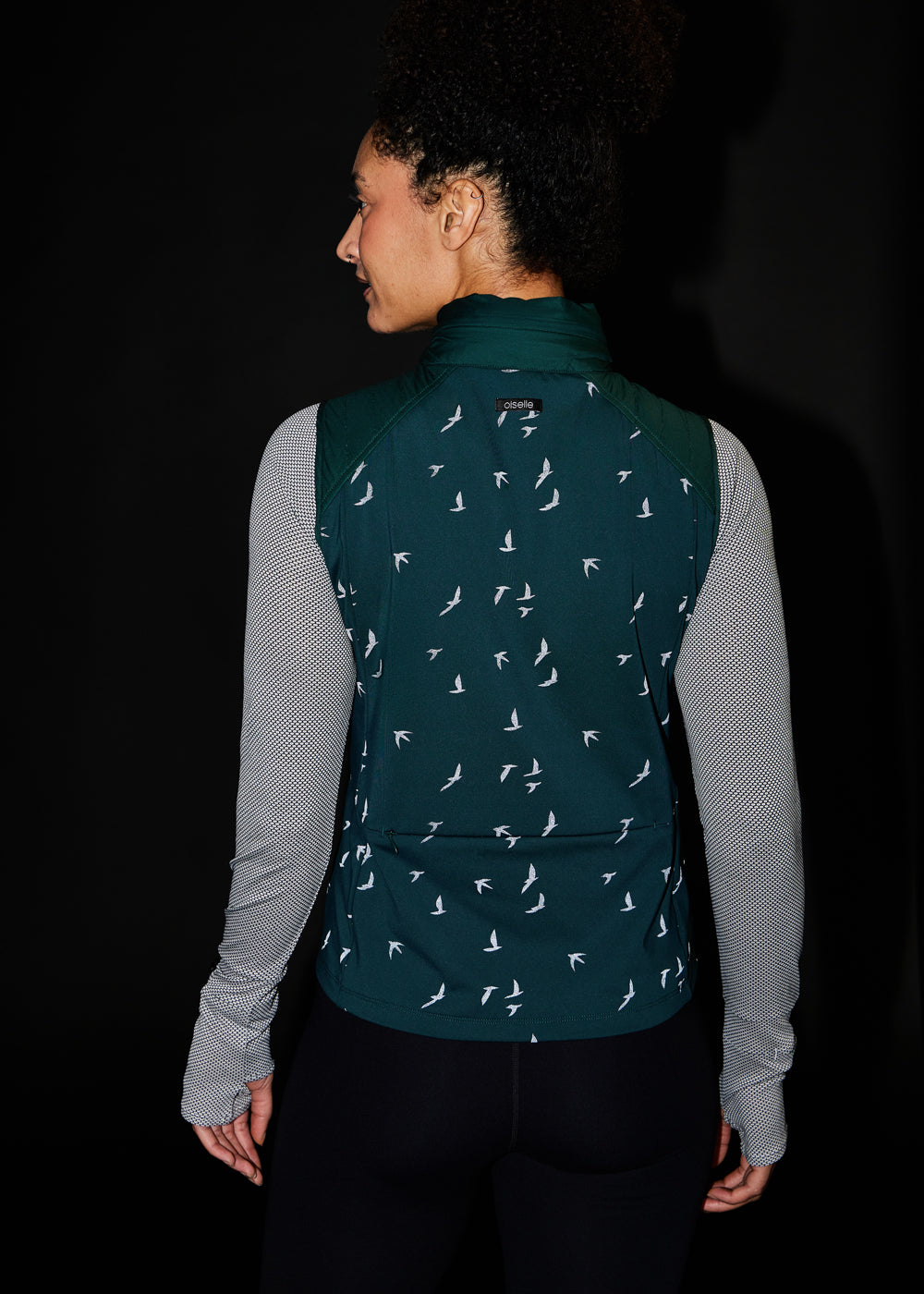Firecracker Insulated Running Vest in Juniper green, reflective back