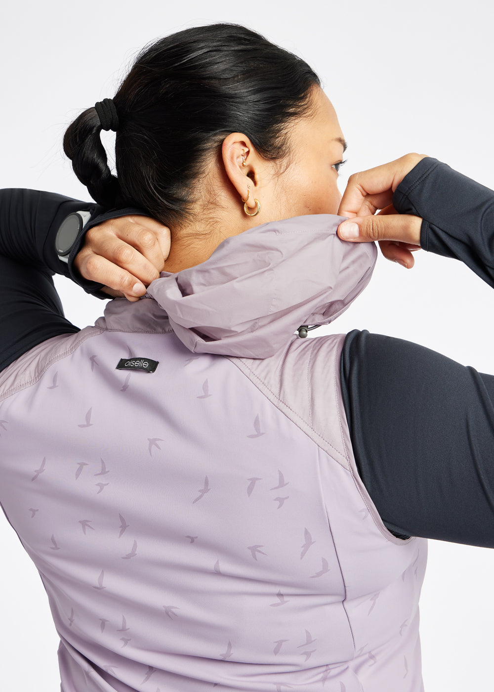 Firecracker Insulated Running Vest in Lavender purple, packable hood