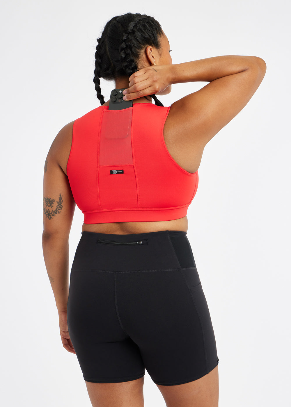 Flyout Sports Bra with pocket in Flash Flare Red, back view pocket detail