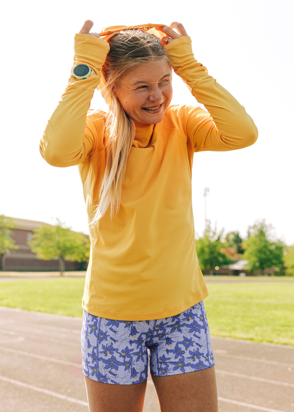 Flyout Chill UPF Lightweight Running Hoodie in Dawn Patrol light orange