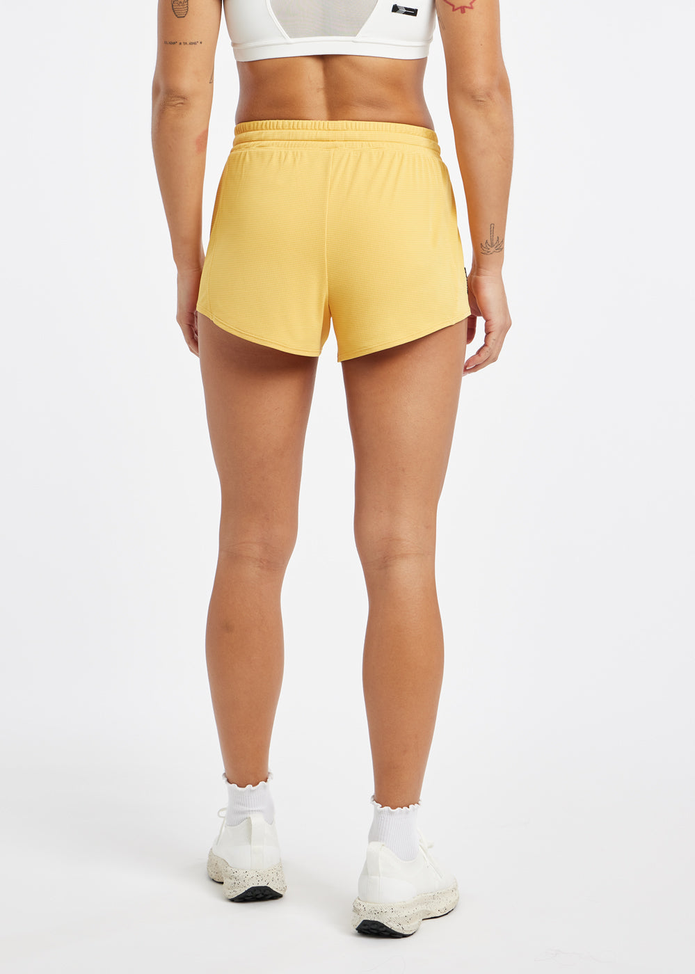 Flyout Chill Shorts in Dawn Patrol light yellow, back view