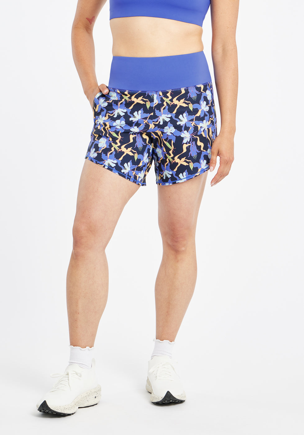 High Rise Roga 6" Running Shorts in blue floral print, front view
