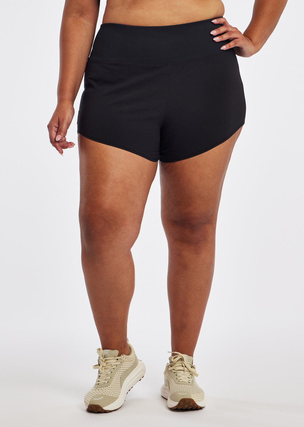 High Rise Roga 4" Running Shorts in black in size 16/18, front view