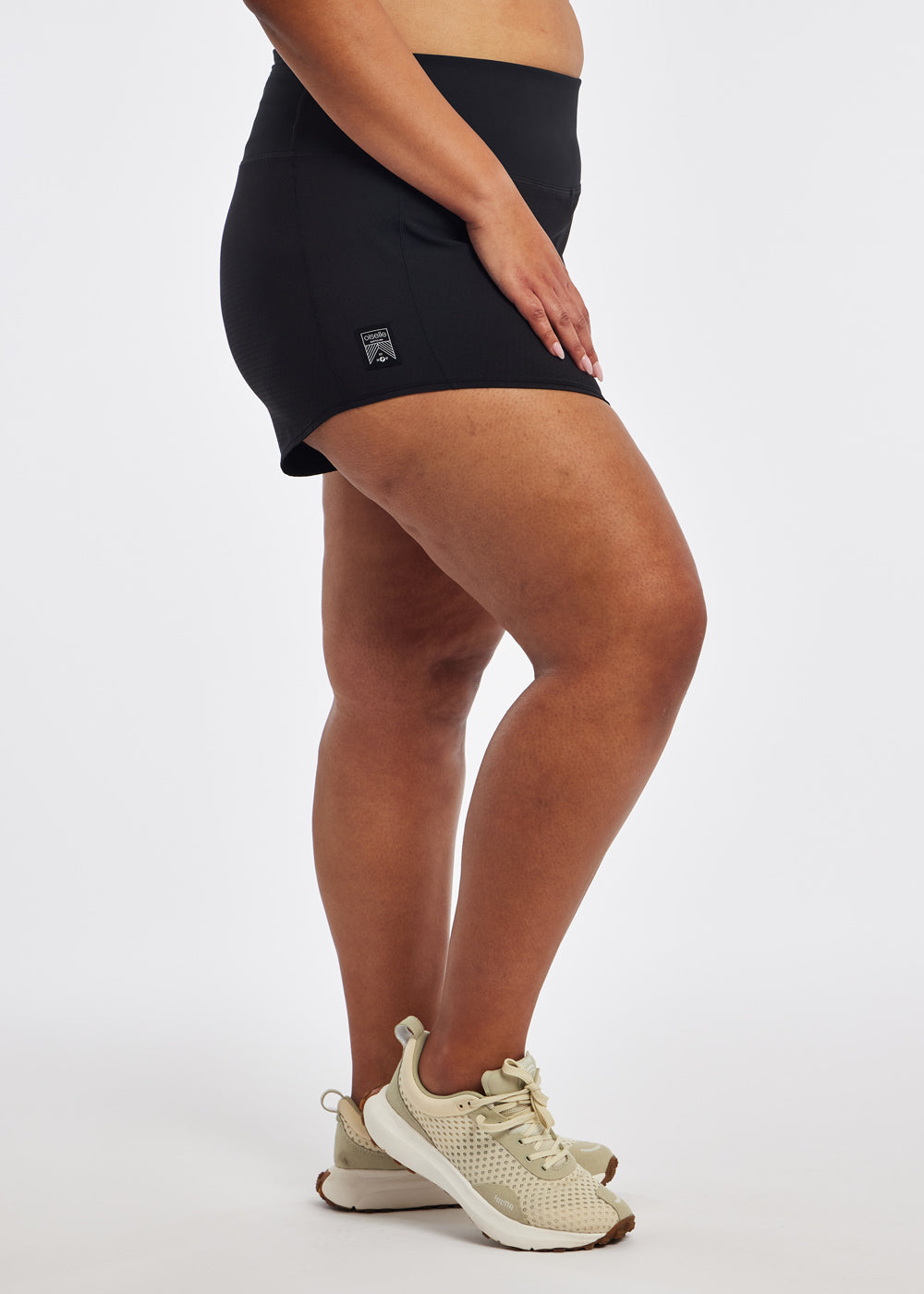 High Rise Roga 4" Running Shorts in black in size 16/18, side view