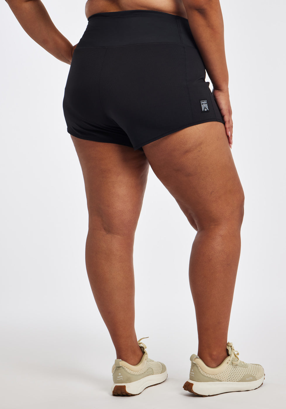 High Rise Roga 4" Running Shorts in black in size 16/18, back view