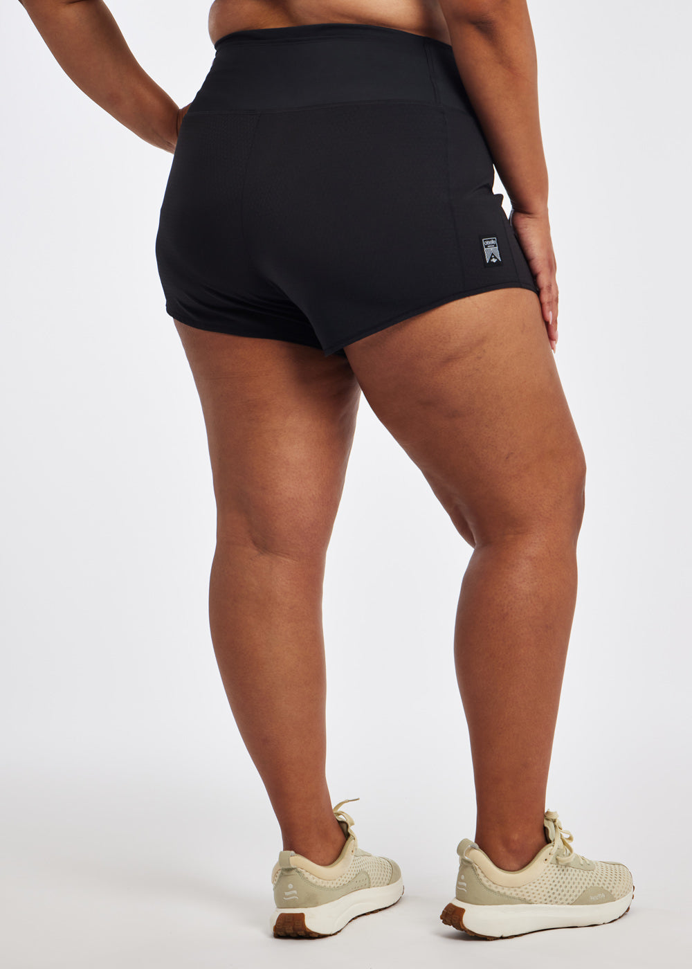 High Rise Roga 4" Running Shorts in black in size 16/18, back view