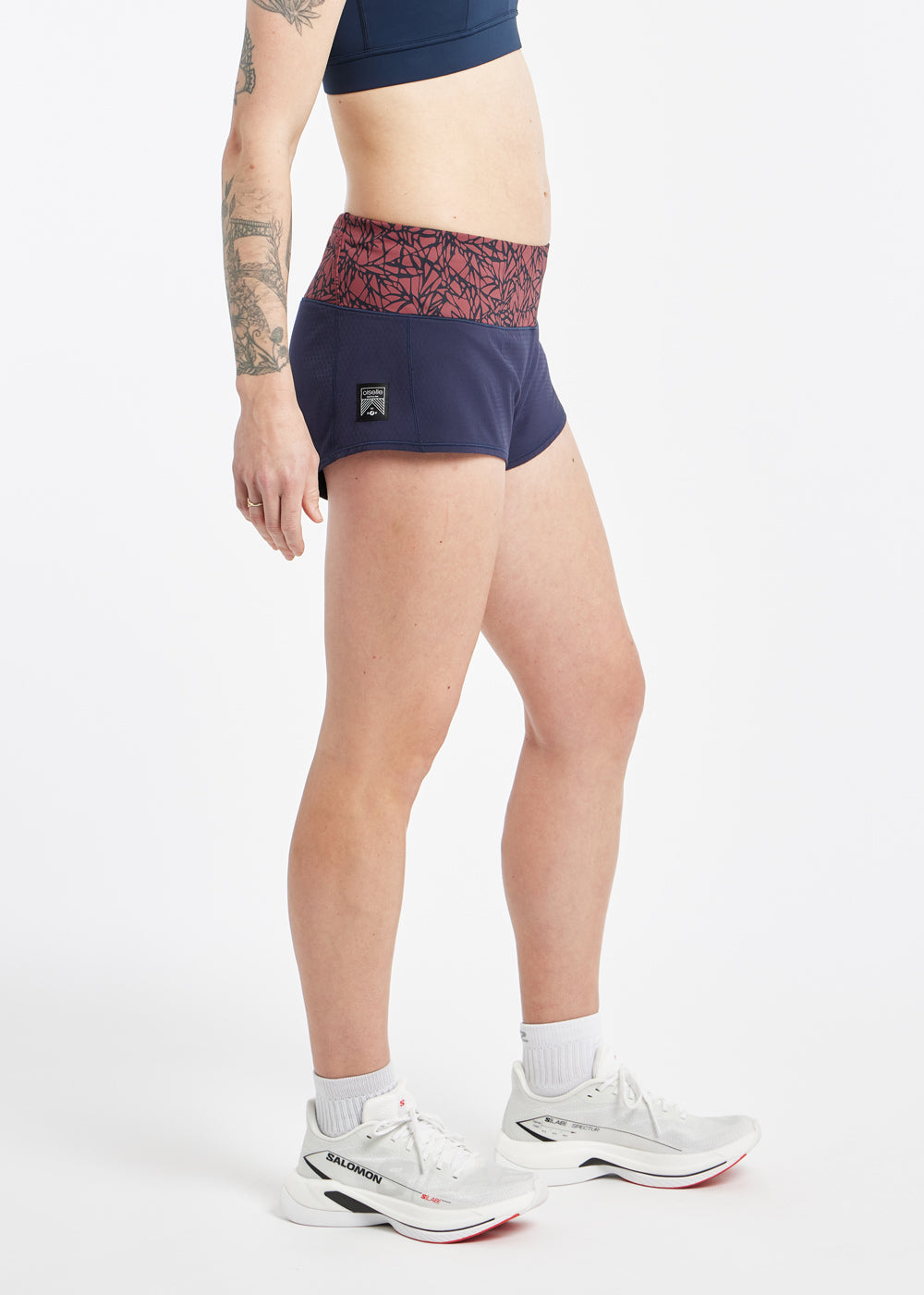 Roga 1.75" Running Shorts in navy with maroon waistband, side view