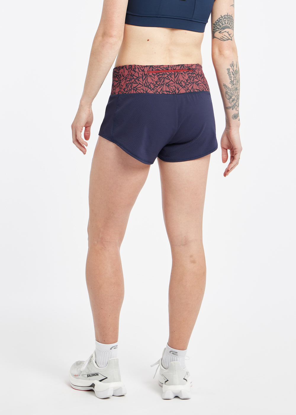 Roga 1.75" Running Shorts in navy with maroon waistband, back view