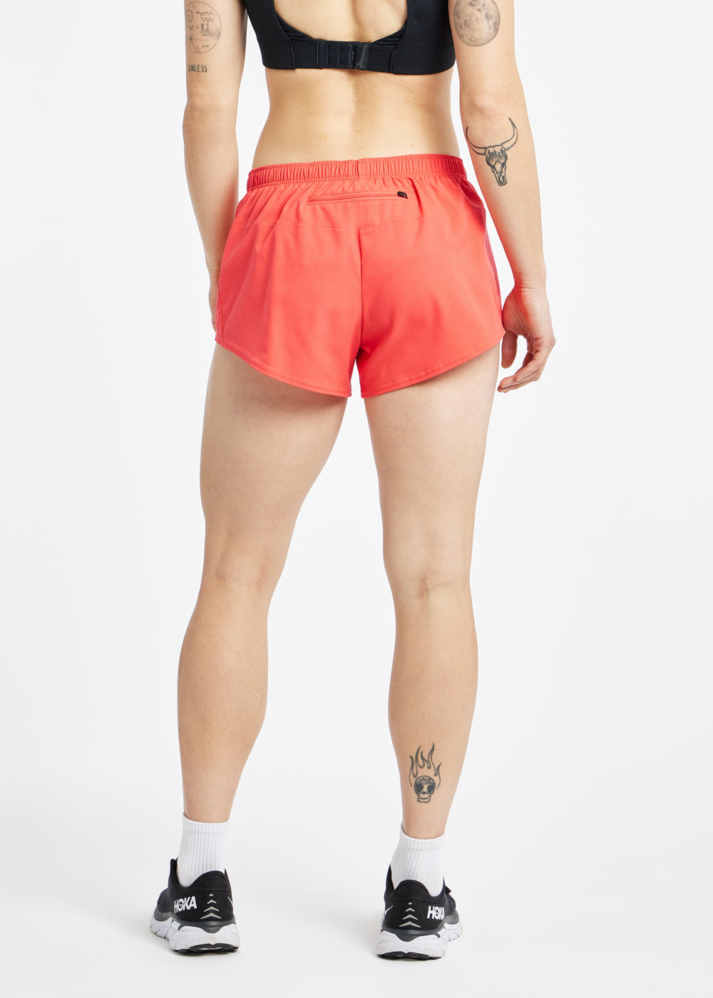 OG Distance 3.25" Running Shorts in Alpenglow orange, back view