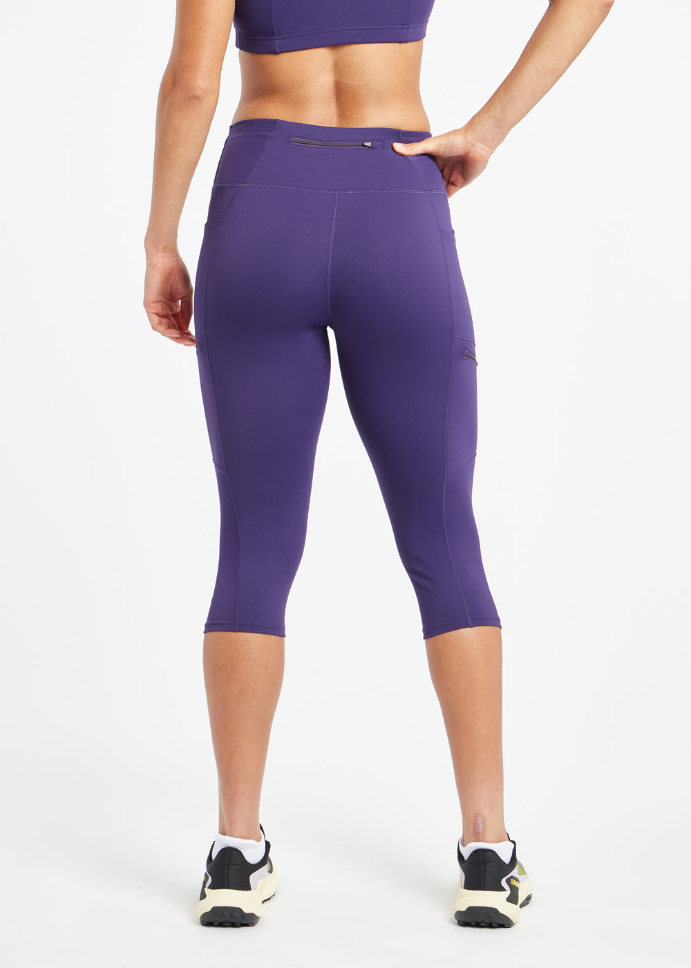 Woman wearing purple knickers in size 6, back view