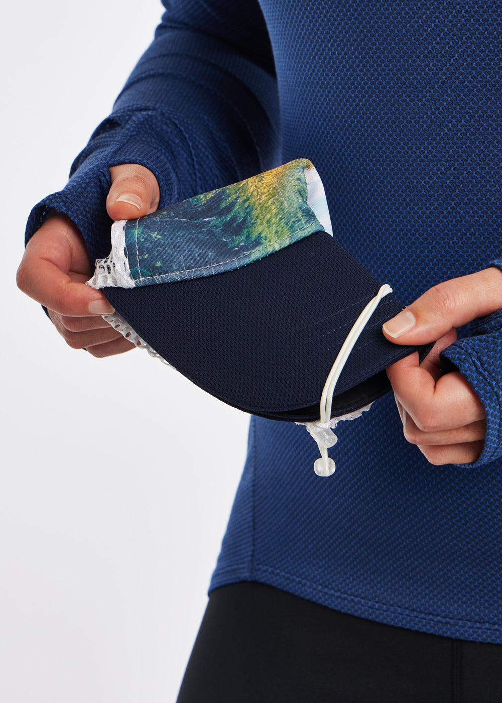 Runner Trucker Hat, panel design of Douglas Fir forest photo, foldable detail view