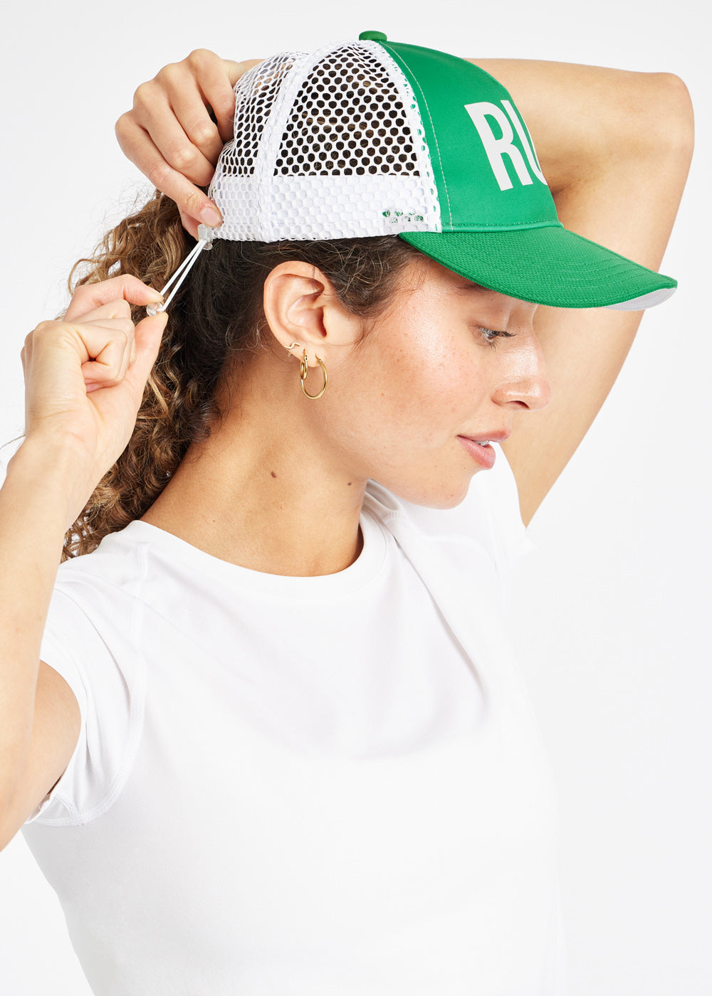 Runner Trucker Hat in Green with RUN on front panel, side view with adjustable toggle closure