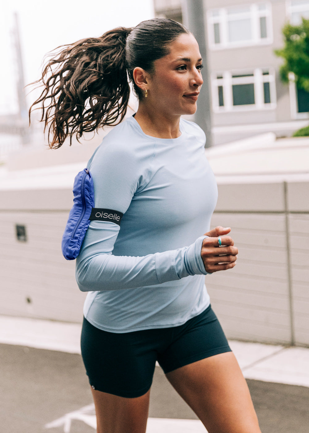 Whirlwind Running Jacket in Blue Rapids, packable design detail view