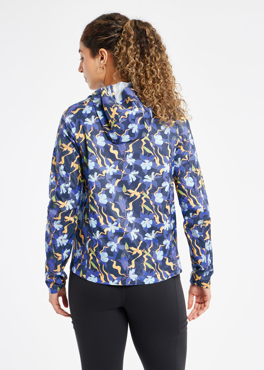 Whirlwind Running Jacket in Ink Blue Aquila Bloom Floral Print, back view