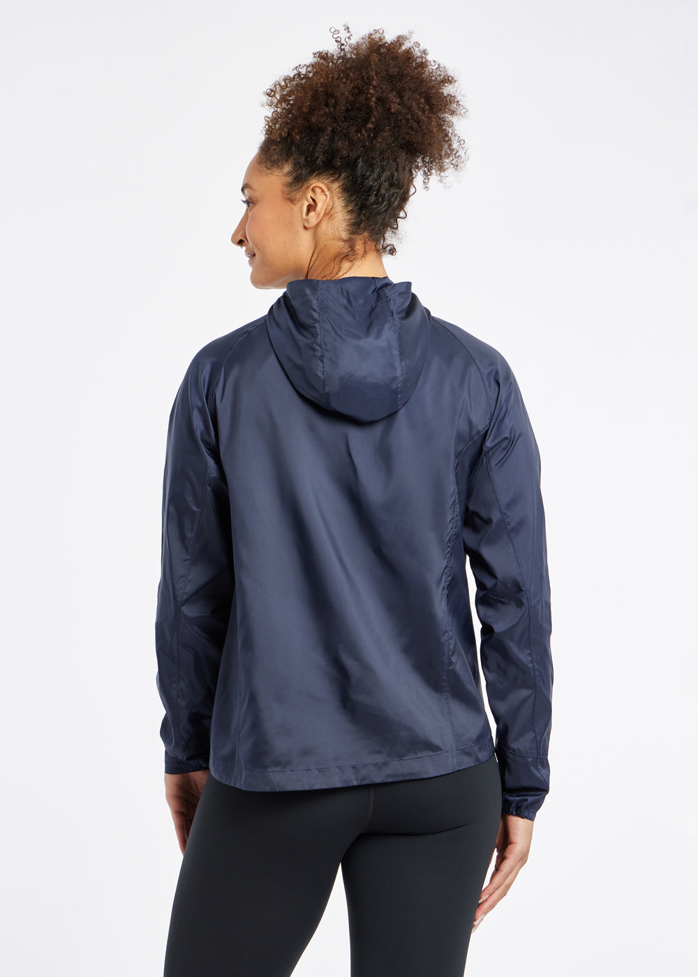 Whirlwind Jacket, a wind resistant running jacket in Ink Blue, back view