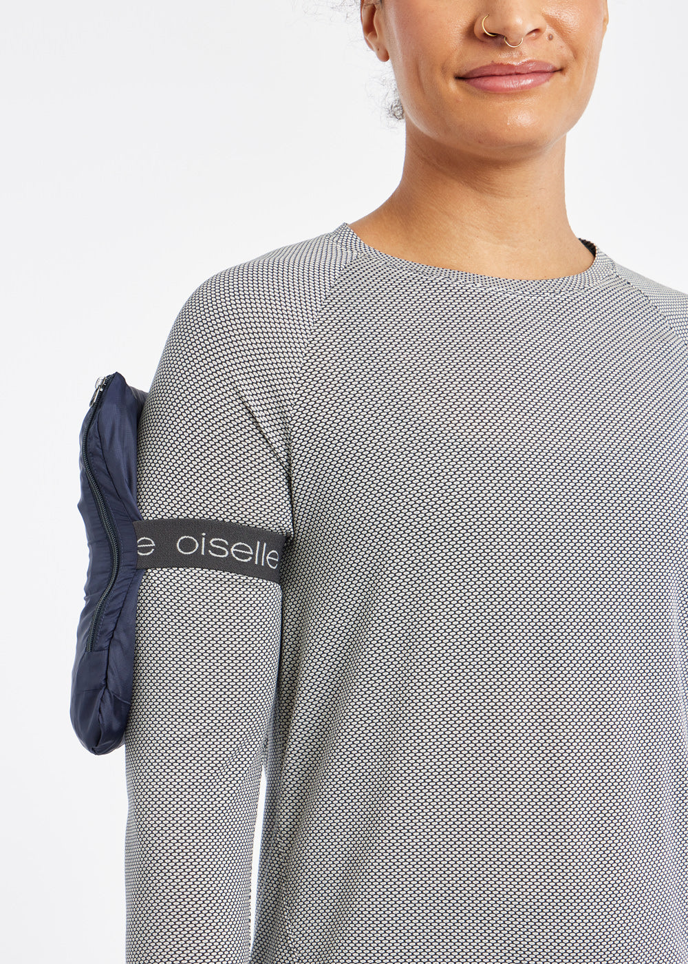 Whirlwind Jacket, a wind resistant running jacket in Ink Blue, packable view