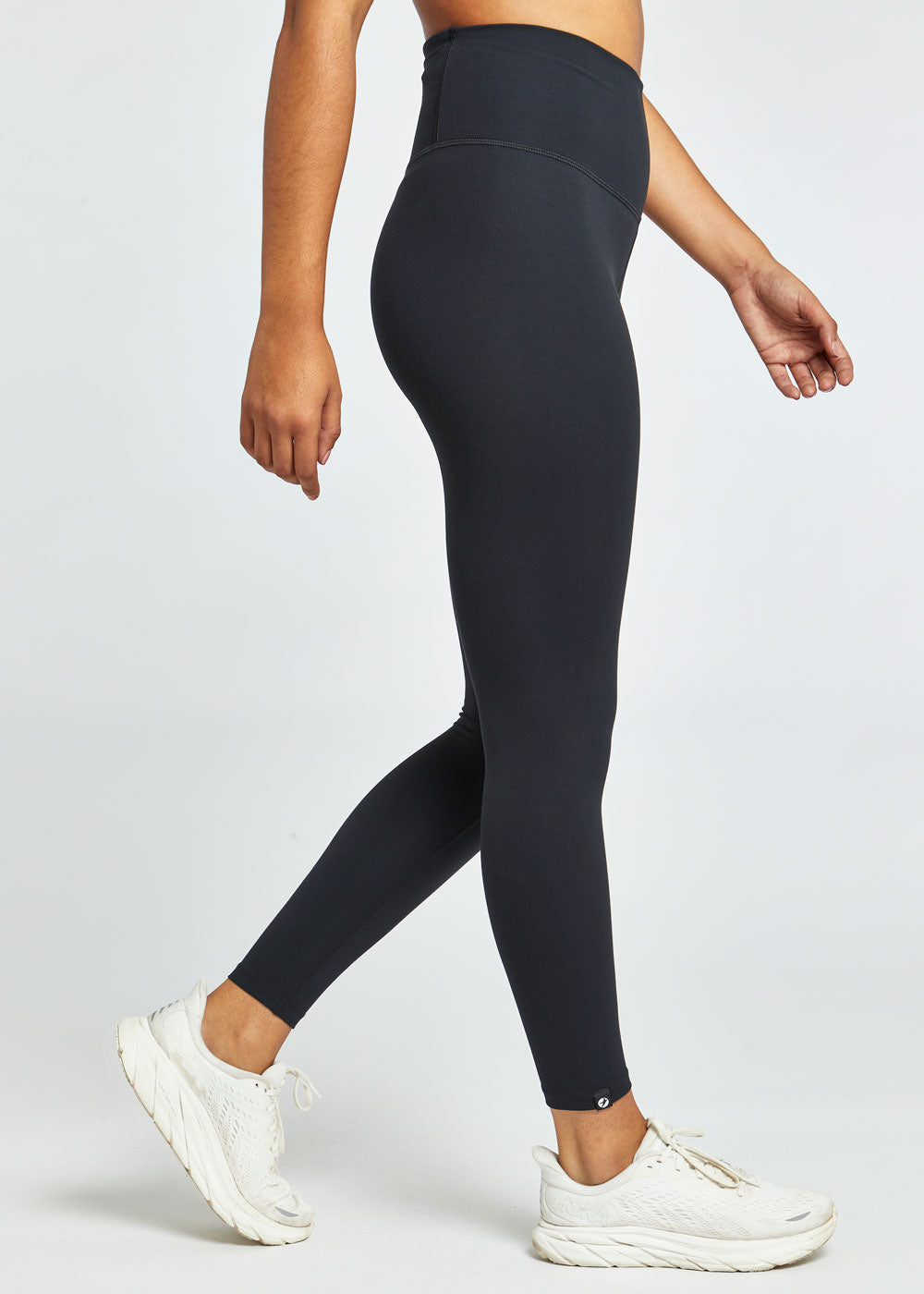 Essential Bird 7/8 length Running Tights in Black, side view
