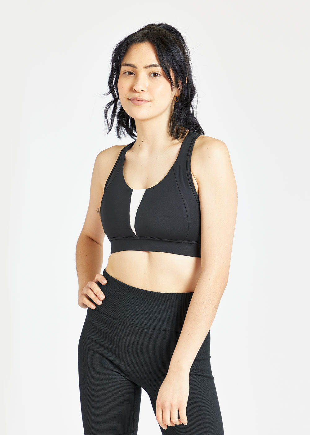 Double Breasted Sports Bra in Black, front view