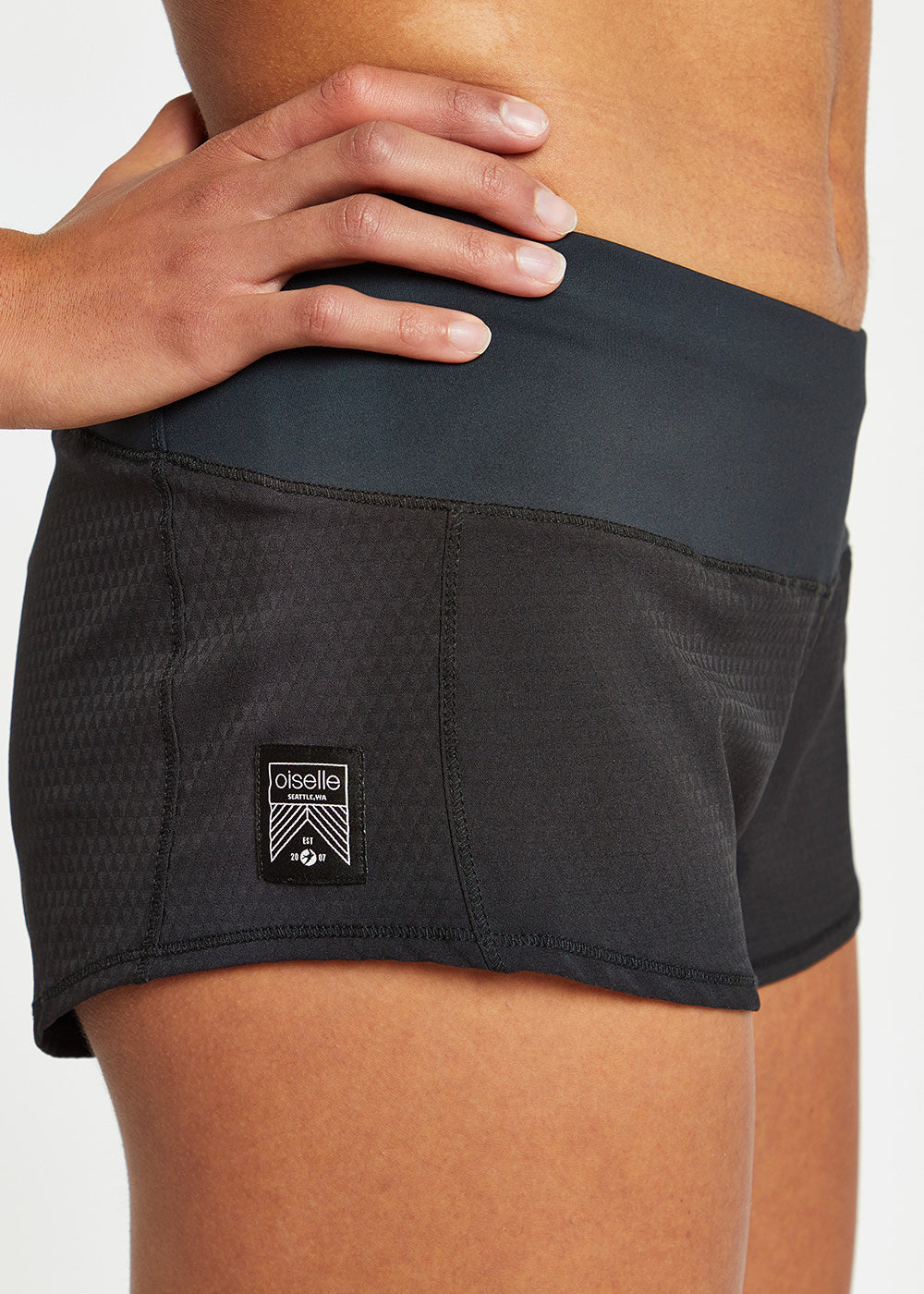 Roga 1.75" Running Shorts in black, close up of side details
