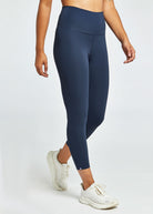 Essential Bird 3/4 length Running Tights in Ink Blue, front view