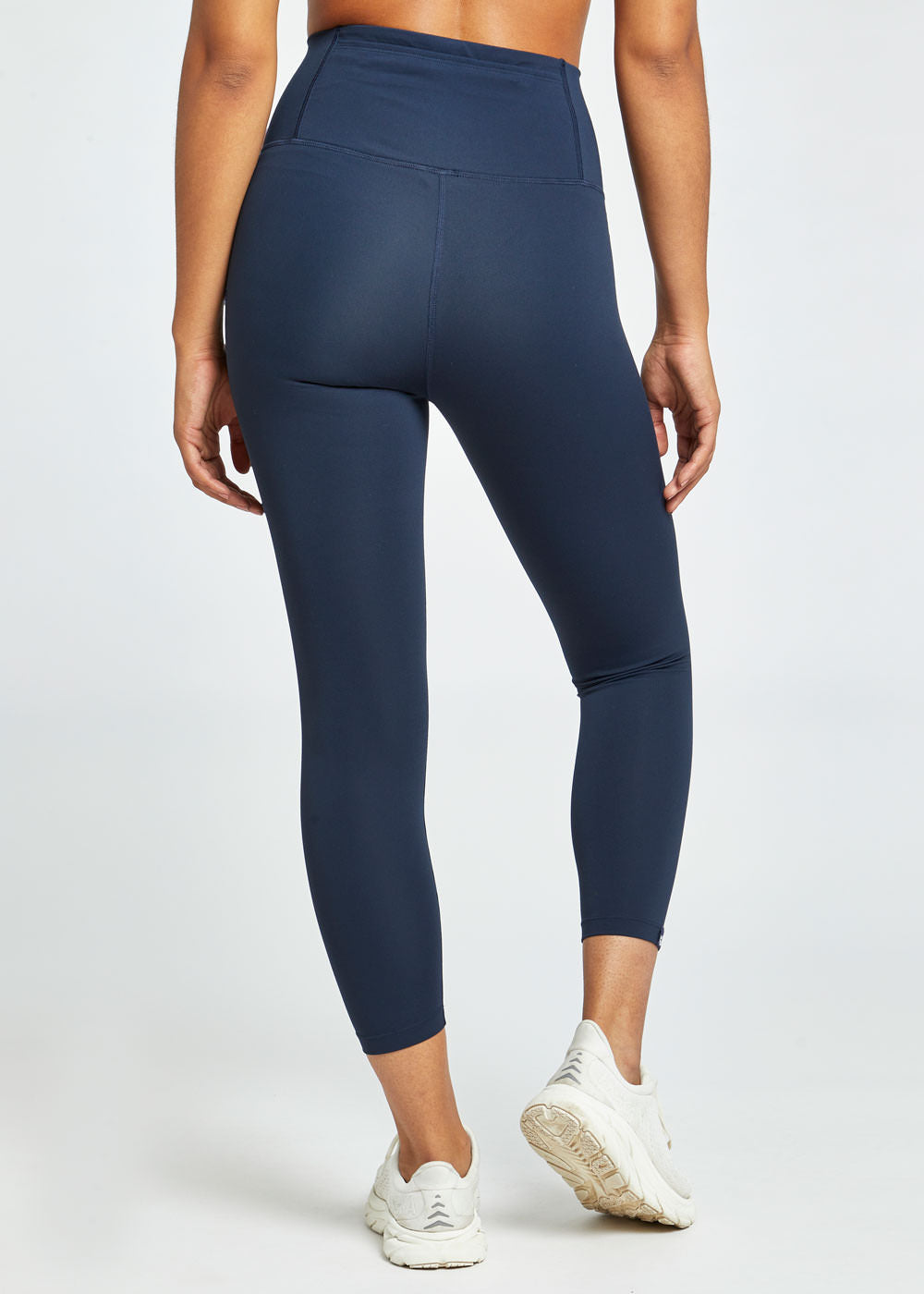 Essential Bird 3/4 length Running Tights in Ink Blue, back view