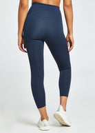 Essential Bird 3/4 length Running Tights in Ink Blue, back view