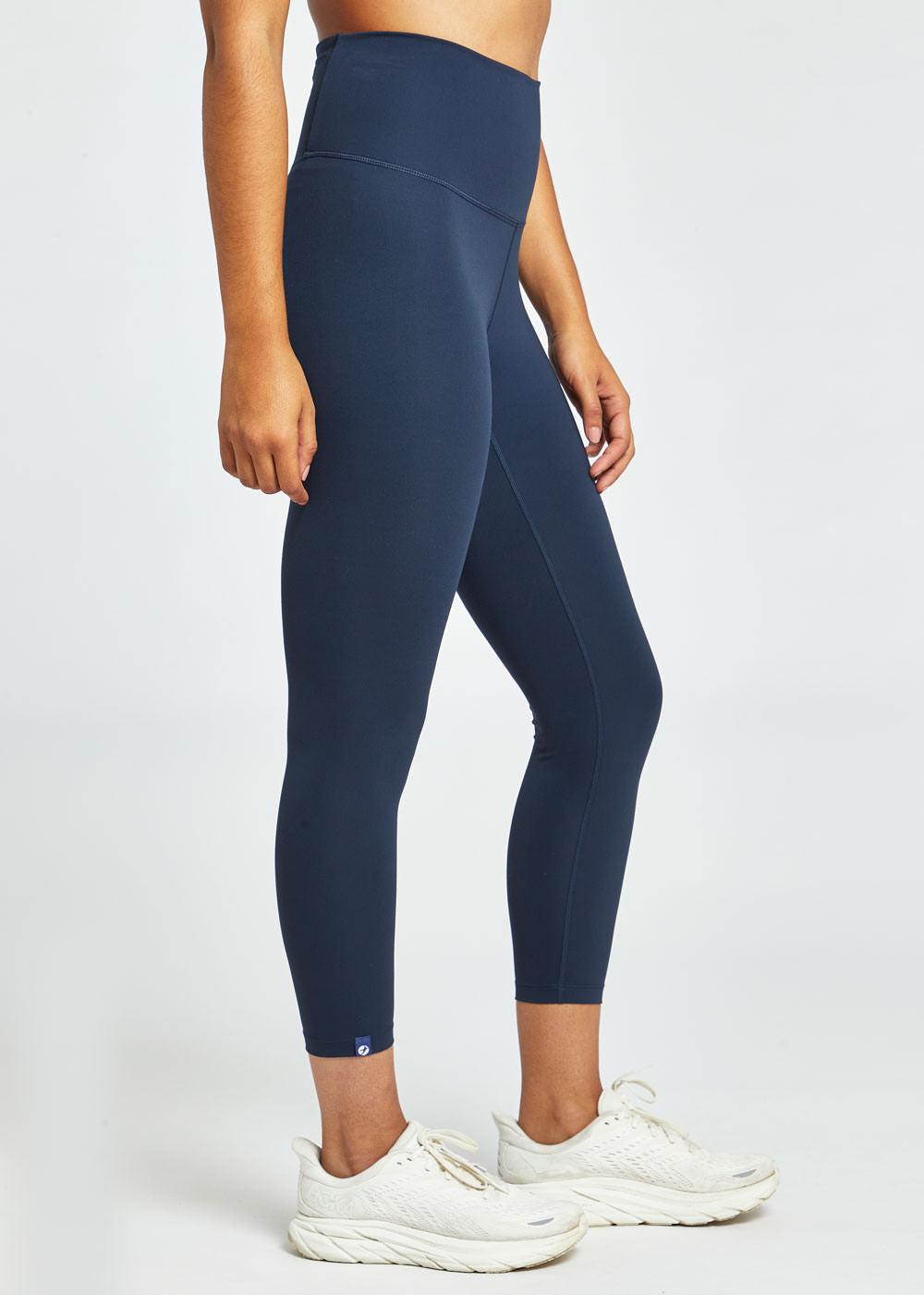 Essential Bird 3/4 length Running Tights in Ink Blue, side view