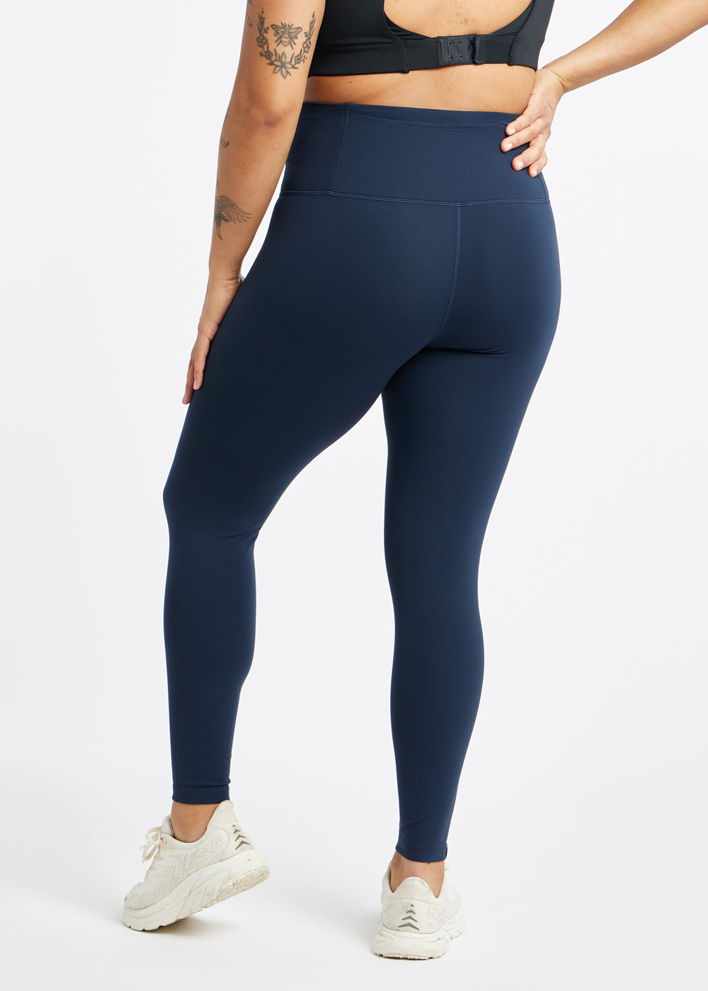 Essential Bird 7/8 length Running Tights in Ink Blue, back