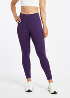 Essential Bird 7/8 length Running Tights in Twilight purple, front view