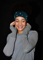 Firecracker Reflective Earband in Juniper green, front