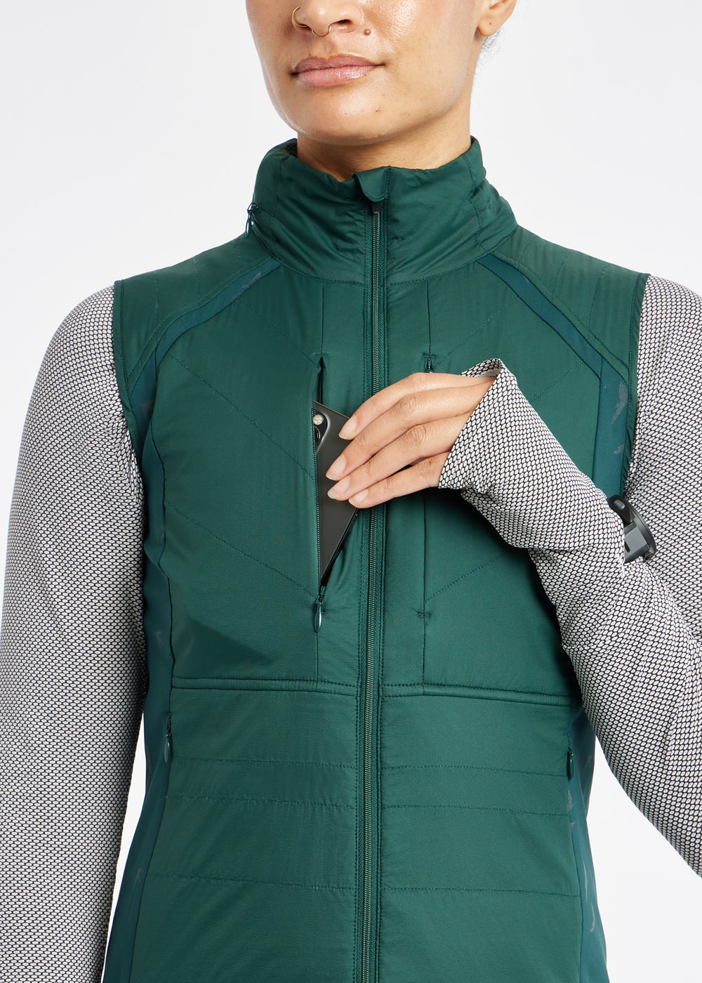 Firecracker Insulated Running Vest in Juniper green, front pocket detail