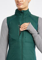 Firecracker Insulated Running Vest in Juniper green, front pocket detail