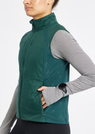 Firecracker Insulated Running Vest in Juniper green, front detail