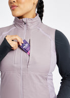 Firecracker Insulated Running Vest in Lavender purple, front pocket detail
