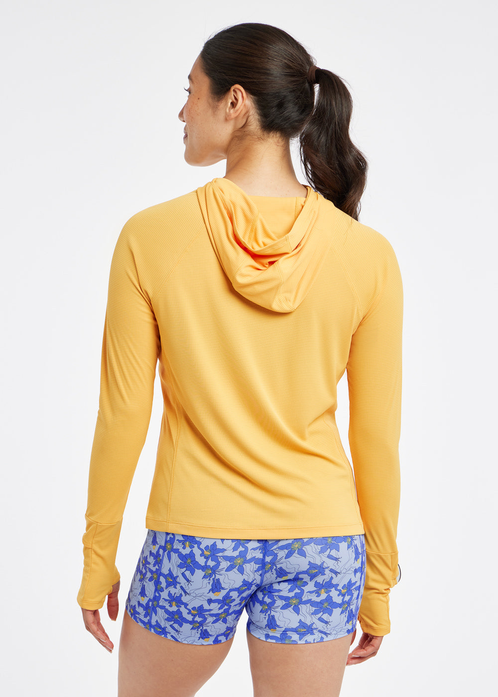 Flyout Chill UPF Lightweight Running Hoodie in Dawn Patrol light orange, back view