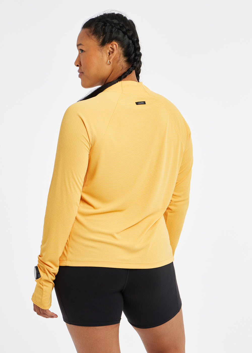 Flyout Chill UPF lightweight running Long Sleeve in Dawn Patrol light orange, back view